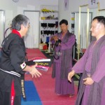 Master Michael Tan receiving Kumdo Black Belt